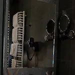 грань *
