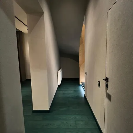 грань *